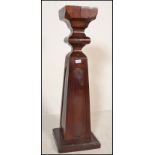 A mahogany antique Victorian style pedestal plant torchere stand of inverse tapering form with