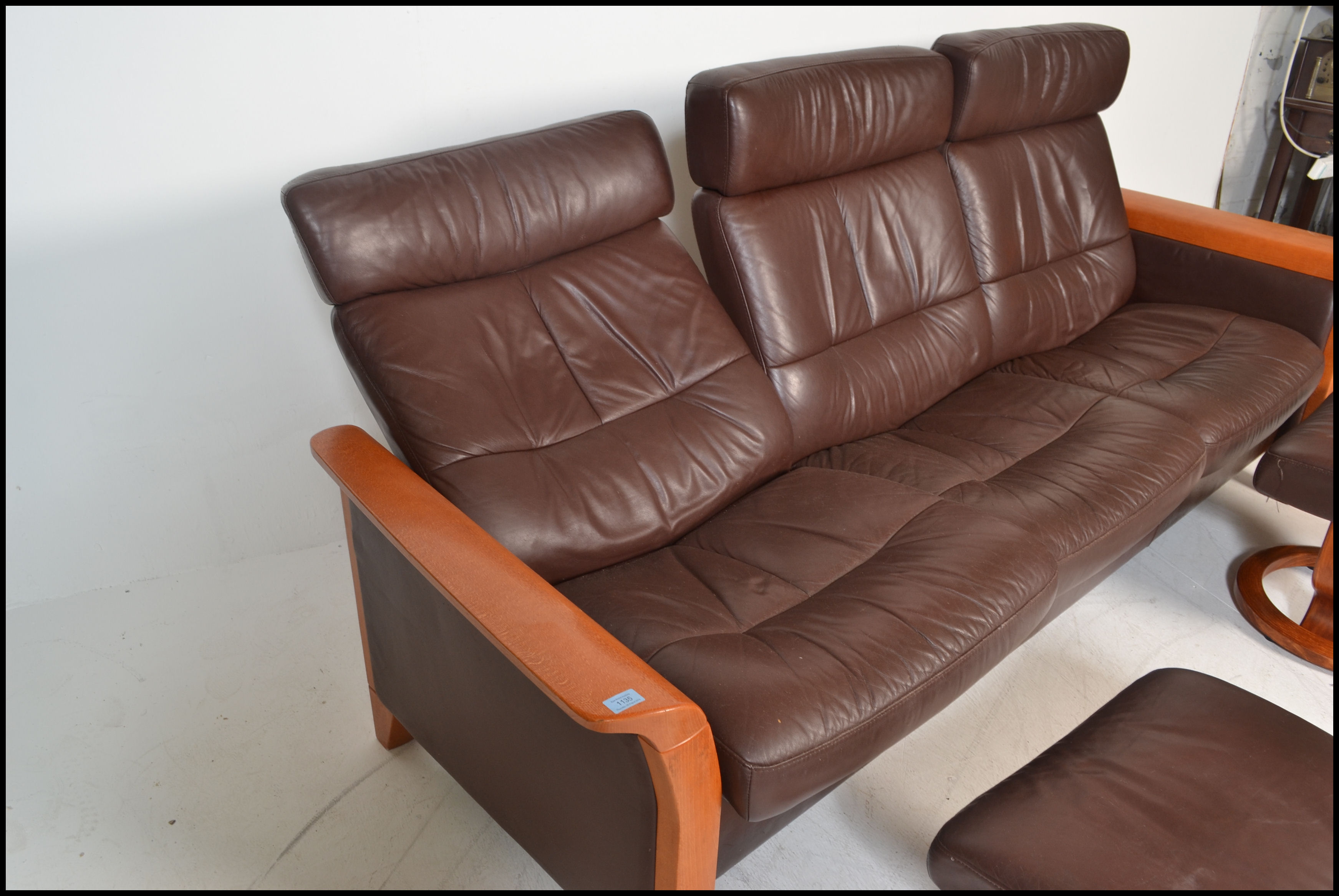 An Ekornes Stressless three seater brown leather Reclining Sofa of Scandinavian design, having - Image 6 of 6
