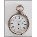 An early 20th century silver cased pocket watch by Henry E Peck Swiss made. The white enamel face
