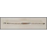 A silver 925 flat belcher link bracelet chain with name / monogram bar united by lobster clasp.