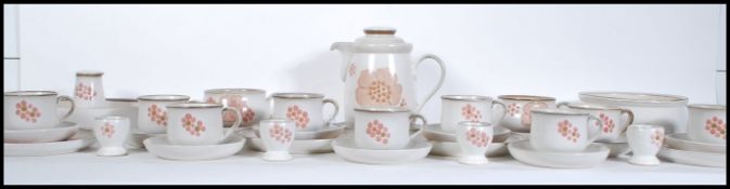 A mid century Denby ' Poppy Pattern ' part dinner & tea service comprising side plates, bowl,