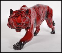 Tiger Stalking HN.1082 Royal Doulton Flambe model of a tiger designed by Charles Noke, modelled