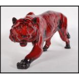 Tiger Stalking HN.1082 Royal Doulton Flambe model of a tiger designed by Charles Noke, modelled