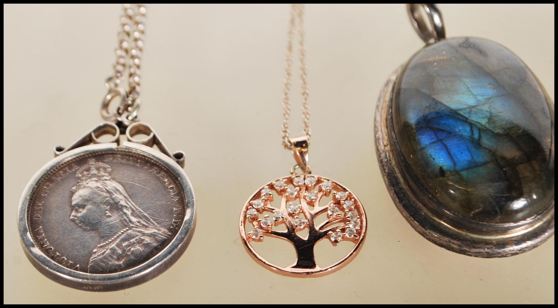 A small group of silver jewelry to include a Victorian coin in a silver mount on a chain, small tree - Image 3 of 8