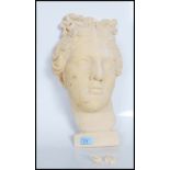 A contemporary 20th Century head wall hanging sculpture of Venus De Milo made from plaster. Measures