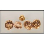 A pair of hallmarked 9ct gold cufflinks of oval form having floral engraving together with a