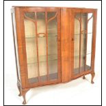 A 1930's Queen Anne walnut china display cabinet b