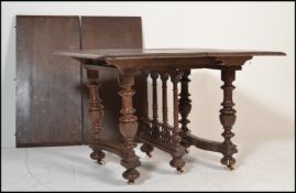 A late 19th Century French provincial walnut twin leaf extendable dining table.  The table being