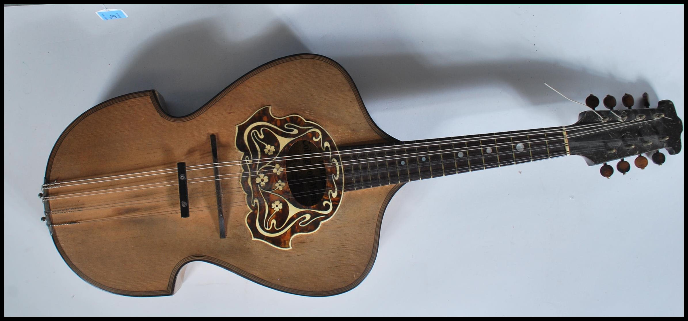 An early 20th Century Mandolin having mother of pearl inlaid fingerboard with bone and tortoiseshell - Image 2 of 7