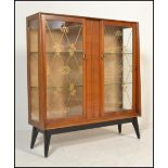 A mid 20th Century walnut glazed display / china cabinet. Full length twin glazed doors with