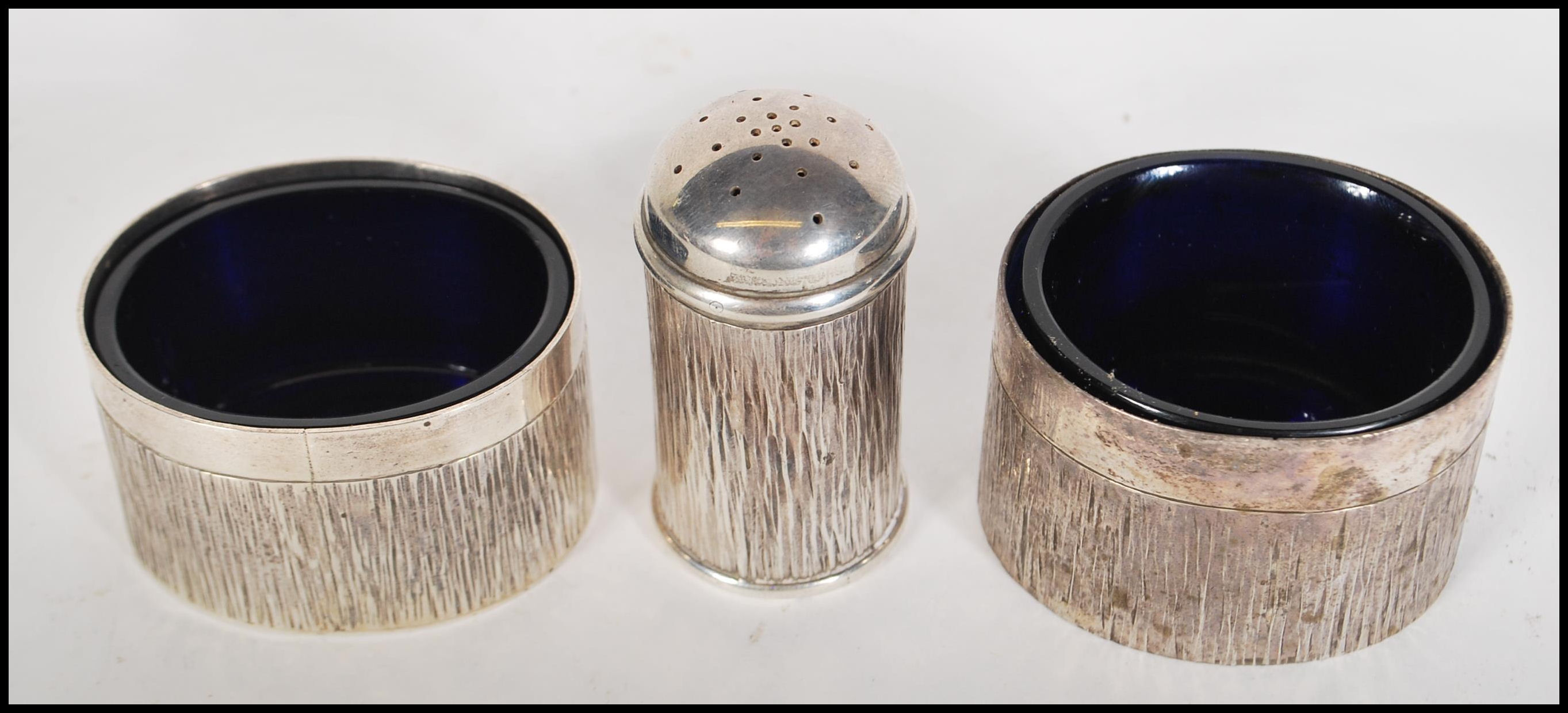 Two silver hallmarked table salts having bark effect decoration and blue glass liners, together with - Image 2 of 5