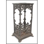 An early 20th Century cast iron ebonised stick stand of rectangular form in the manner of