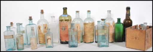 A collection of 19th Century Victorian apothecary medicinal bottles most with their original