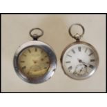 Two silver hallmarked open face pocket watches dating from the late 19th Century. Both having