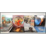 A collection of long play LP vinyl records from various artists to include Slade, Wreckless Eric,