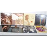 A collection of long play LP vinyl records to include Led Zeppelin II (2), In Trough The Out Door,