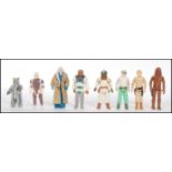A GROUP OF EIGHT STAR WARS ACTION FIGURES