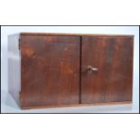 A mahogany coin collectors cabinet, fitted with 14 slide out drawers containing coins dating from