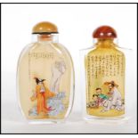 A pair of 20th Century Chinese glass perfume scent bottle, interior painted with elders, figures and