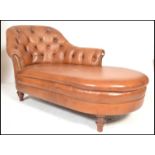 A contemporary antique revival tan brown leather button back chesterfield style chaise longue