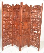 A 20th century asiatic hardwood ladies 4 fold - folding / freestanding discretion screen. Each panel