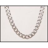 A hallmarked 925 silver heavy curb chain necklace having a lobster claw clasp. Measures 22 inches.
