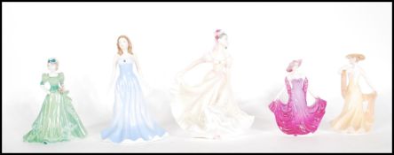 A group of five ceramic figurines to include Royal Doulton Pretty Ladies Lynette, Doulton