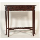 An early 20th Century 1910 Art Nouveau mahogany hall / console table having a pierced fretwork