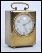 An early 20th Century brass / bronze cased desk tr