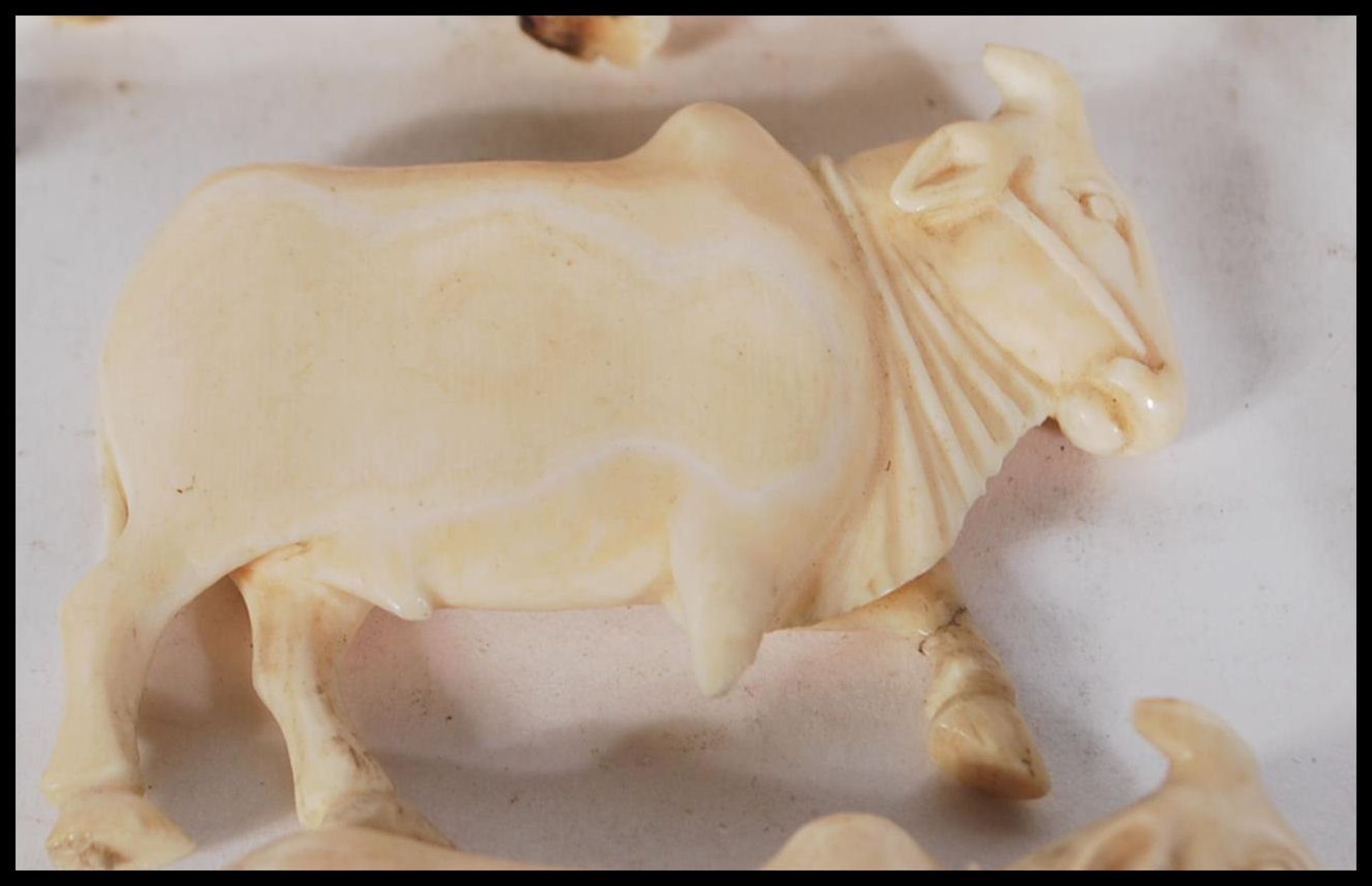 A group of late 19th Century carved ivory figurines to include Indian figures and animals - Image 6 of 12