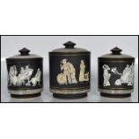 A set of 3 late 19th century pratt ware / Fenton of Pratt ' Old Greek ' pattern tobacco jars. Each