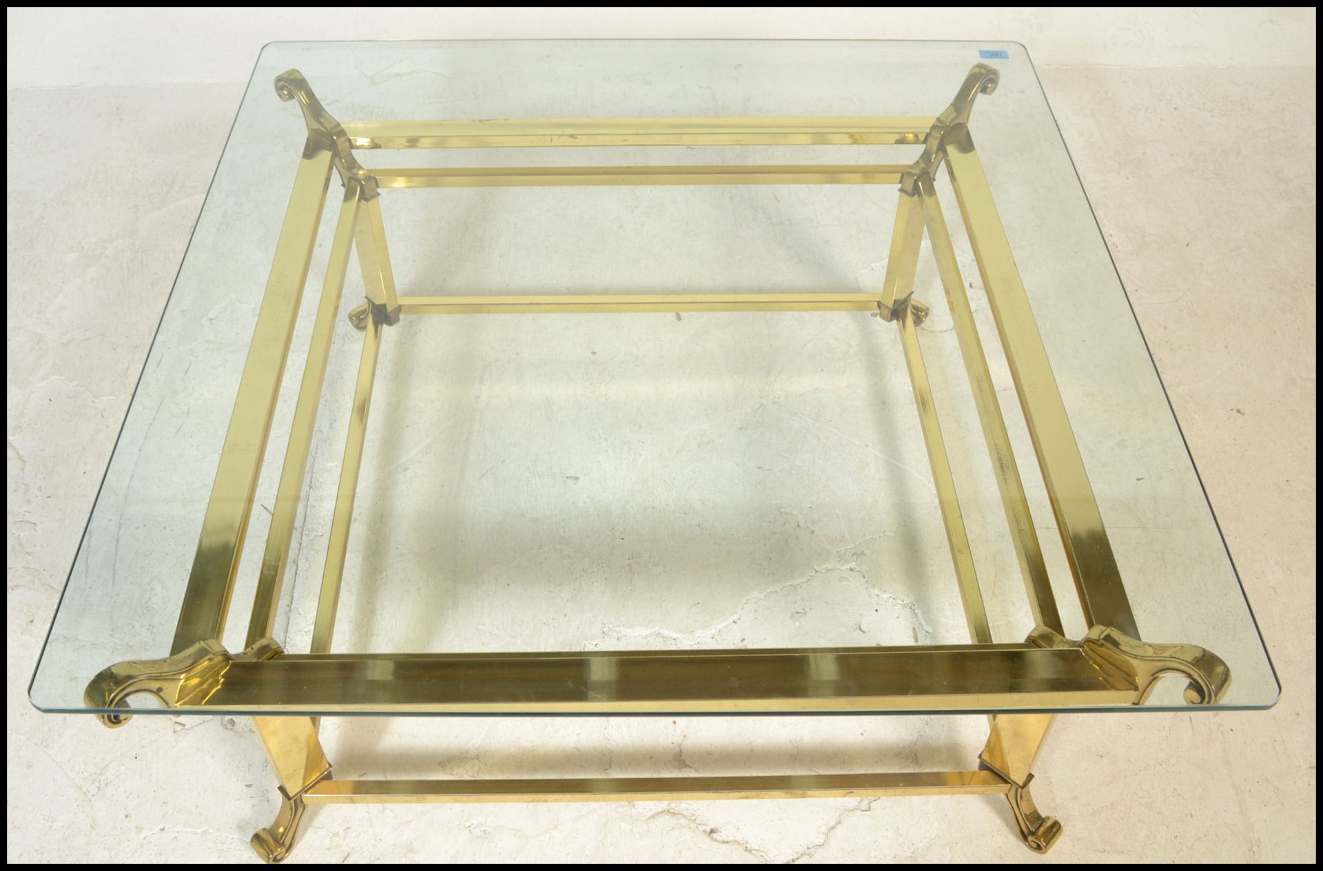 A 20th Century brass and glass top Italian design coffee table of square form raised on scroll - Bild 3 aus 5