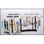 A collection of vintage and retro 20th Century and later wrist watches of various designs to include