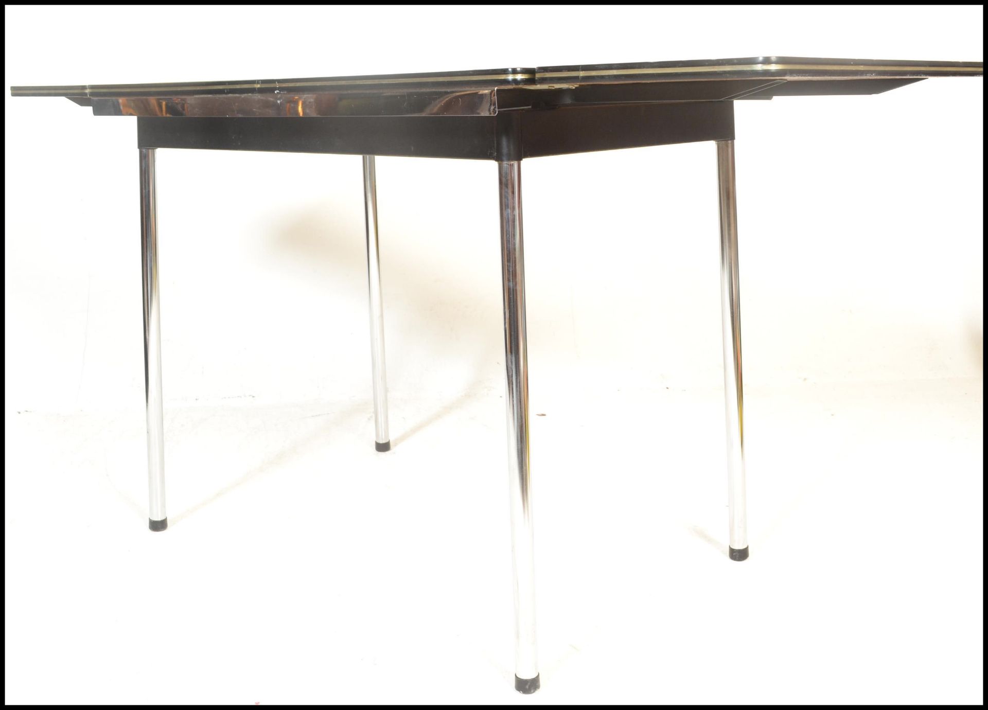 An original  retro 1970's Belgian Tavo dining table raised on chrome supports  extending table top - Bild 7 aus 12