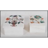 Two white marble boxes having semi precious stones inset into the lids creating floral decoration,