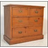 A Victorian 19th century walnut cottage chest of drawers. Raised on a plinth base having 2 short