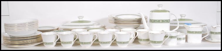 A Royal Doulton Rondelay pattern dinner / tea service comprising dinner plates, side plates, dishes,