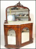 A 19th century high Victorian walnut and marble  mirror back pier cabinet chiffonier. Raised on a