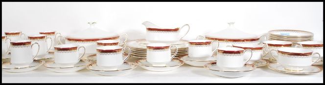 An extensive Royal Albert dinner service in the Holyrood pattern consisting of six dinner plates,