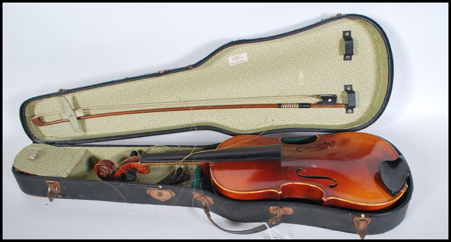 A 20th Century Violin musical instrument having a one piece maple back with spruce front. Ebonised