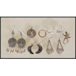 A collection of stamped 925 silver jewellery to include a pair of celtic knot earrings, a pair of