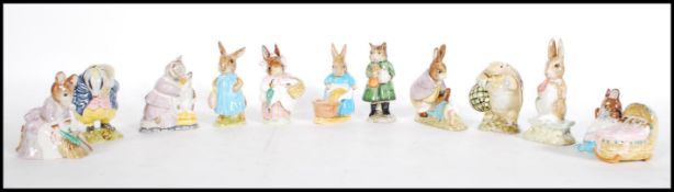 A collection of eleven Beswick Beatrix potter figurines to include Mrs Rabbit, Cecily Parsley, Hunca