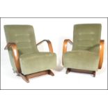 A pair of early 20th century, circa 1940's bentwood rocking chairs - armchairs. Raised on beech wood