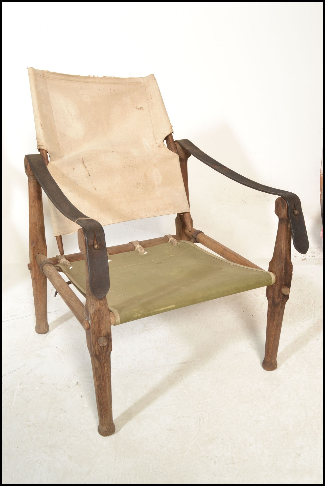 A vintage mid century Safari Chair designed and in the manner of Kaare Klint. The wooden framed - Bild 5 aus 9