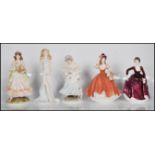 A collection of ceramic figurines to include Coalport Dance Of Dawn, Ladies Of Fashion Flora,