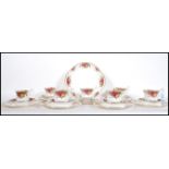 A Royal Albert Old Country Roses pattern tea service comprising of six cups, saucers and tea plates,