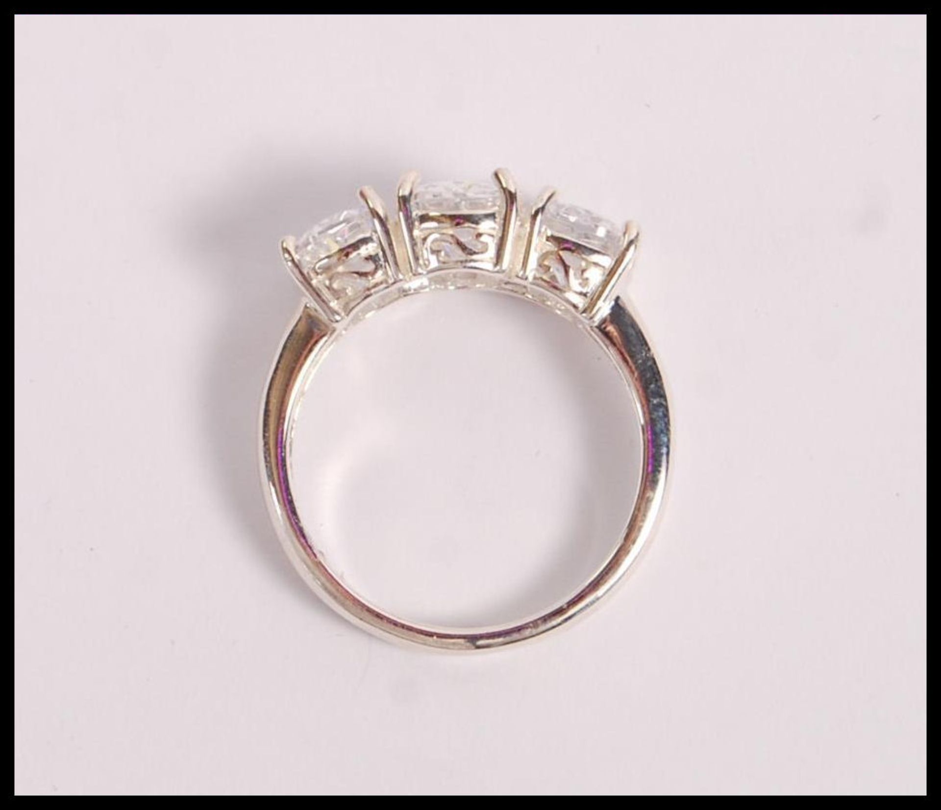 A stamped 925 silver dress ring set with three oval cut CZ's. Total weight 5.1g. Size P. - Image 2 of 2