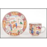 A 19th Century Chinese cup and saucer having hand painted oriental scene with floral and pattern