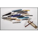 A collection of vintage writing pens and pencils to include a Swan Self Filler pen, a Rufford marble