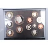 A Royal Mint 2009 UK proof twelve coin set including scarce Kew Gardens 50p, within leather case